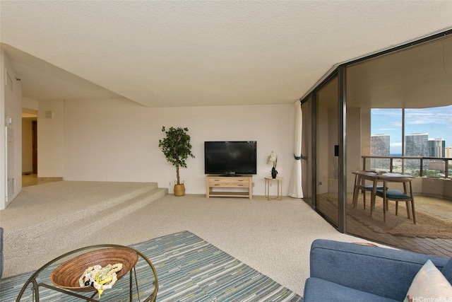 1221 Victoria St Unit 2301, Honolulu, HI 96814 - living room featuring carpet flooring and a wall of windows