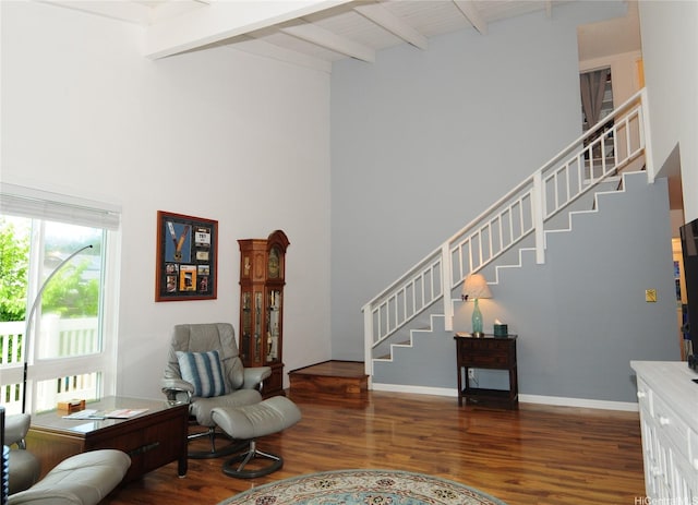 47-643 Hui Ulili St, Kaneohe, HI 96744 - living room featuring stairway, wood finished floors, beam ceiling, and a towering ceiling