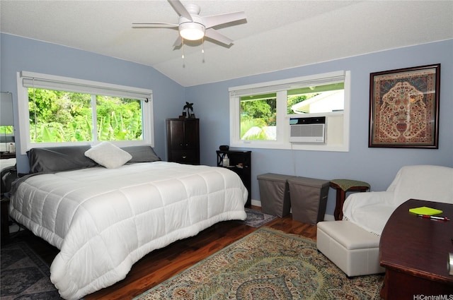 47-643 Hui Ulili St, Kaneohe, HI 96744 - bedroom featuring vaulted ceiling, multiple windows, wood finished floors, cooling unit, and a ceiling fan