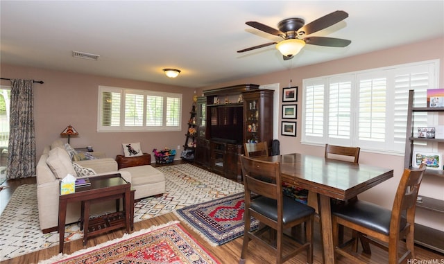 91-1268 Kilipue St, Ewa Beach, HI 96706 - living room with plenty of natural light, wood finished floors, and ceiling fan