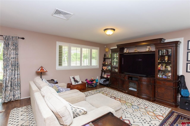 91-1268 Kilipue St, Ewa Beach, HI 96706 - living room with healthy amount of natural light and wood finished floors