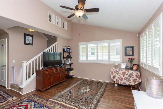 91-1268 Kilipue St, Ewa Beach, HI 96706 - living room with stairway, dark wood-type flooring, healthy amount of natural light, lofted ceiling, and a ceiling fan