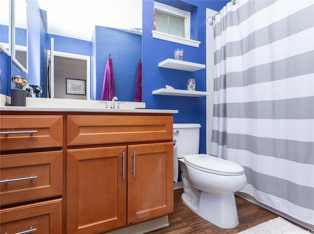 91-1268 Kilipue St, Ewa Beach, HI 96706 - bathroom with wood finished floors, vanity, and curtained shower