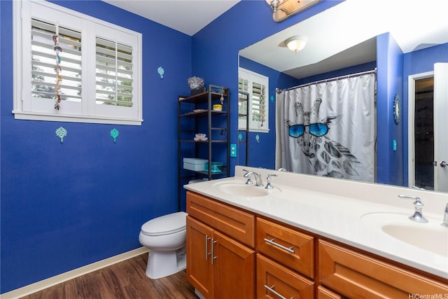 91-1268 Kilipue St, Ewa Beach, HI 96706 - bathroom featuring wood finished floors and double vanity