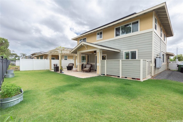91-1268 Kilipue St, Ewa Beach, HI 96706 - back of property featuring a fenced backyard, a patio, and ceiling fan
