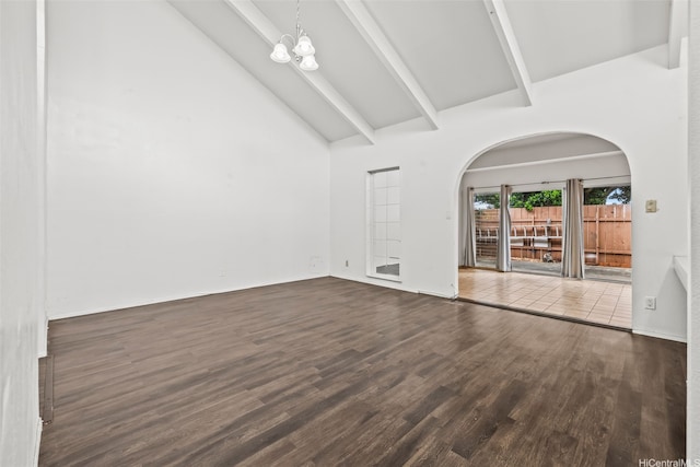 94-011 Kuahelani Ave Unit 135, Mililani, HI 96789 - spare room with high vaulted ceiling, arched walkways, wood finished floors, beam ceiling, and a chandelier