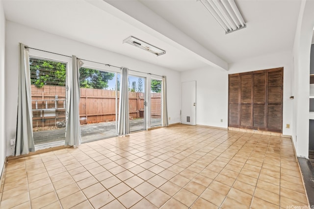 94-011 Kuahelani Ave Unit 135, Mililani, HI 96789 - unfurnished room featuring light tile patterned floors