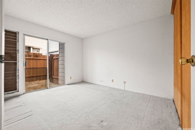 94-011 Kuahelani Ave Unit 135, Mililani, HI 96789 - unfurnished room with carpet and a textured ceiling