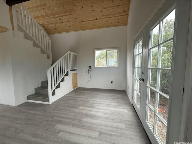 94-6342 Makai St, Naalehu, HI 96772 - staircase featuring wooden ceiling, wood finished floors, and lofted ceiling