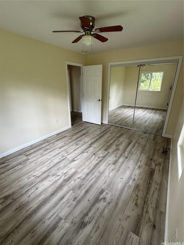16-2075 Vista Dr, Pahoa, HI 96778 - unfurnished bedroom with wood finished floors, a closet, and ceiling fan
