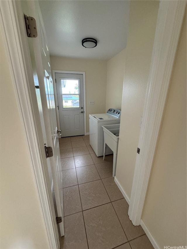 16-2075 Vista Dr, Pahoa, HI 96778 - washroom featuring washing machine and clothes dryer and light tile patterned floors