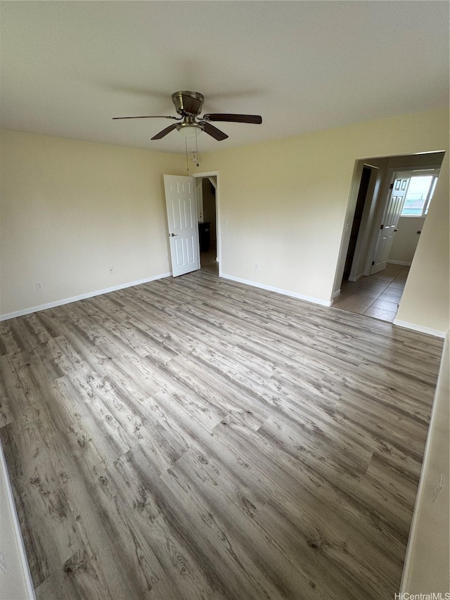 16-2075 Vista Dr, Pahoa, HI 96778 - empty room with wood finished floors and ceiling fan
