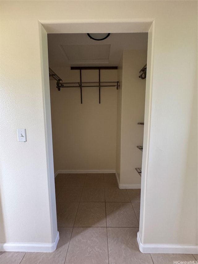 16-2075 Vista Dr, Pahoa, HI 96778 - spacious closet featuring light tile patterned flooring and attic access