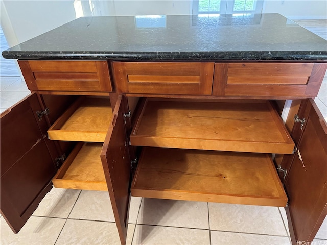 16-2075 Vista Dr, Pahoa, HI 96778 - detailed view of brown cabinetry and dark stone counters