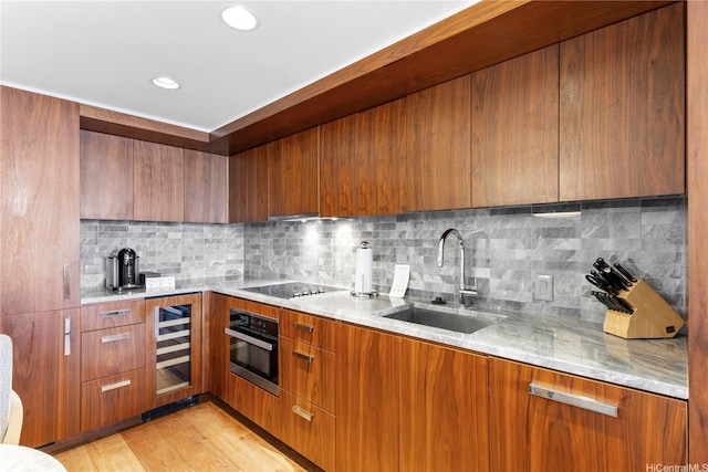 383 Kalaimoku St Unit 3109, Honolulu, HI 96815 - kitchen featuring modern cabinets, brown cabinetry, wine cooler, oven, and recessed lighting