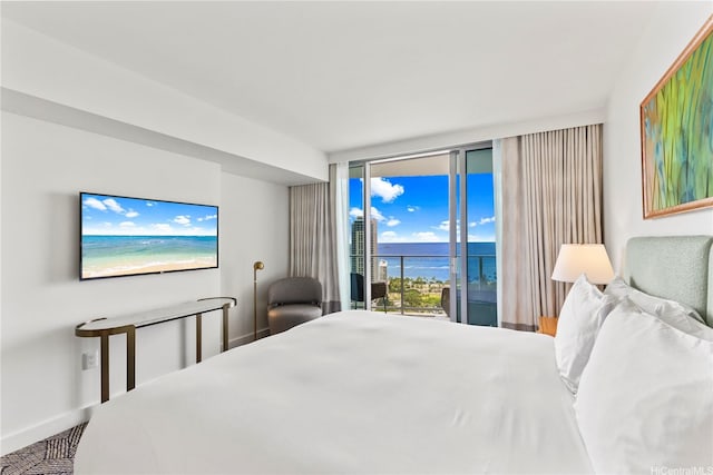 383 Kalaimoku St Unit 3109, Honolulu, HI 96815 - bedroom featuring access to outside and expansive windows