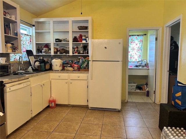 15-2737 Lalakea St, Pahoa, HI 96778 - kitchen featuring white appliances, open shelves, light tile patterned flooring, light countertops, and vaulted ceiling