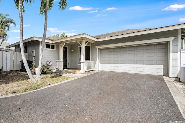 91-1033 Keokolo St Unit B, Kapolei, HI 96707 - ranch-style home featuring asphalt driveway, a garage, and a shingled roof