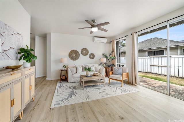 91-1033 Keokolo St Unit B, Kapolei, HI 96707 - sitting room featuring a ceiling fan, light wood finished floors, and a wall mounted air conditioner