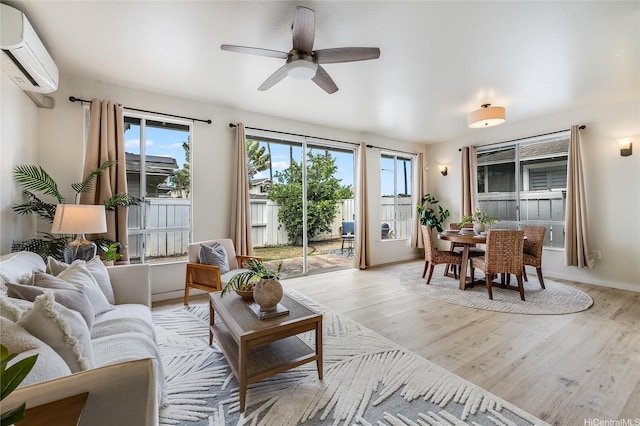 91-1033 Keokolo St Unit B, Kapolei, HI 96707 - living area featuring a wall mounted air conditioner, light wood-type flooring, and ceiling fan