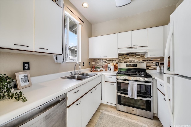 91-1033 Keokolo St Unit B, Kapolei, HI 96707 - kitchen featuring appliances with stainless steel finishes, light countertops, white cabinets, and recessed lighting
