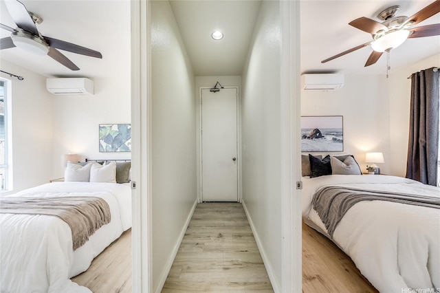 91-1033 Keokolo St Unit B, Kapolei, HI 96707 - bedroom with light wood finished floors, recessed lighting, a wall unit AC, and a ceiling fan