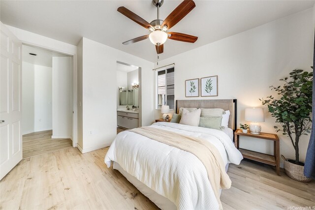 91-1033 Keokolo St Unit B, Kapolei, HI 96707 - bedroom with light wood-style flooring, connected bathroom, and a ceiling fan