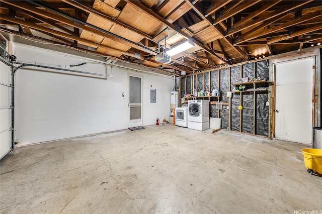 91-1033 Keokolo St Unit B, Kapolei, HI 96707 - garage with washer and clothes dryer, electric panel, a garage door opener, and water heater