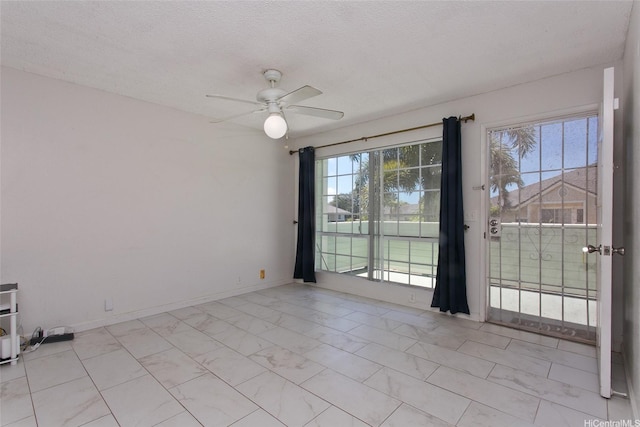 94-1475 Waipio Uka St Unit H206, Waipahu, HI 96797 - empty room with light marble finish flooring, ceiling fan, and a textured ceiling