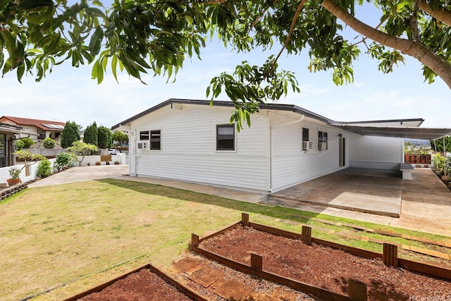 1806 Hoolaa Way, Pearl City, HI 96782 - view of side of home featuring a vegetable garden and a patio area