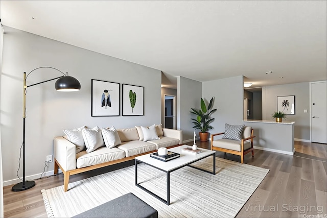 95-2035 Waikalani Pl Unit B303, Mililani, HI 96789 - living area featuring wood finished floors and baseboards