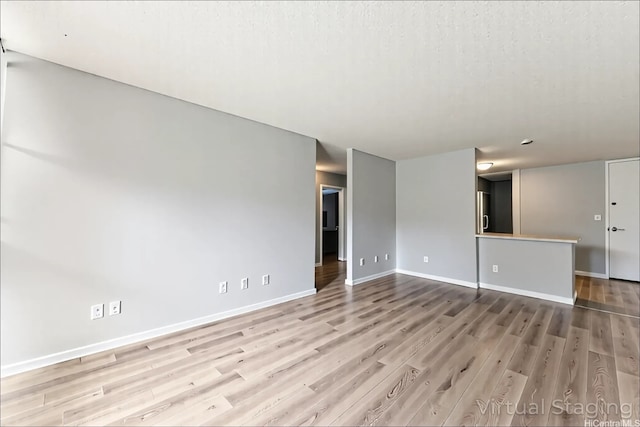 95-2035 Waikalani Pl Unit B303, Mililani, HI 96789 - empty room featuring baseboards and wood finished floors