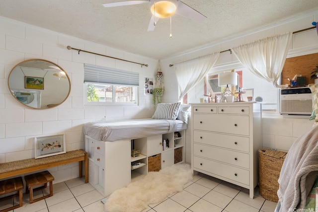 55-439 Naniloa Loop, Laie, HI 96762 - bedroom with light tile patterned flooring, a textured ceiling, and tile walls