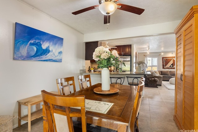 55-439 Naniloa Loop, Laie, HI 96762 - dining room with a ceiling fan, a textured ceiling, and light tile patterned flooring