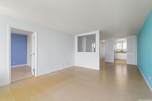 469 Ena Rd Unit 3208, Honolulu, HI 96815 - unfurnished living room with wood finished floors