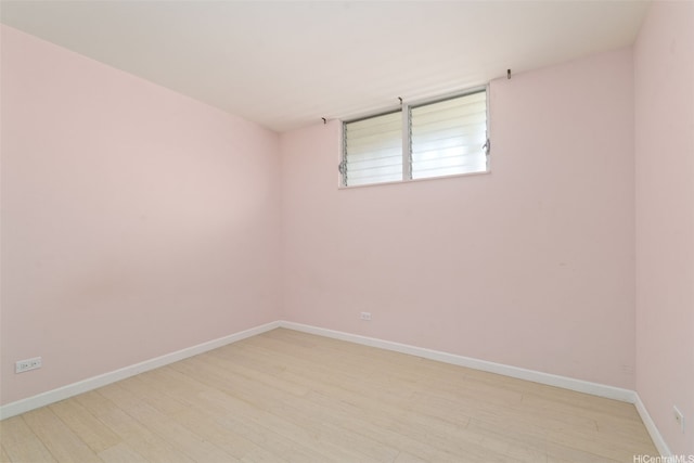 469 Ena Rd Unit 3208, Honolulu, HI 96815 - spare room featuring light wood finished floors and baseboards