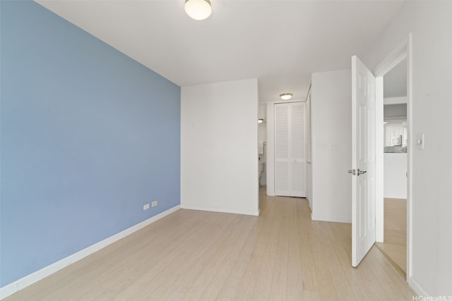 469 Ena Rd Unit 3208, Honolulu, HI 96815 - unfurnished room featuring wood finished floors and baseboards