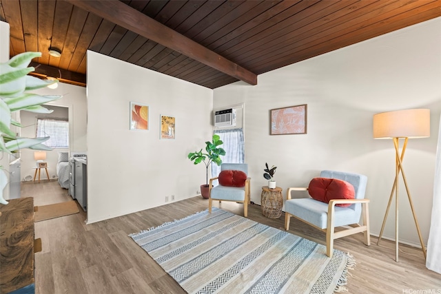 222 Kawaikui Pl, Honolulu, HI 96821 - living area featuring a wooden ceiling with exposed beams, wood finished floors, and an AC wall unit