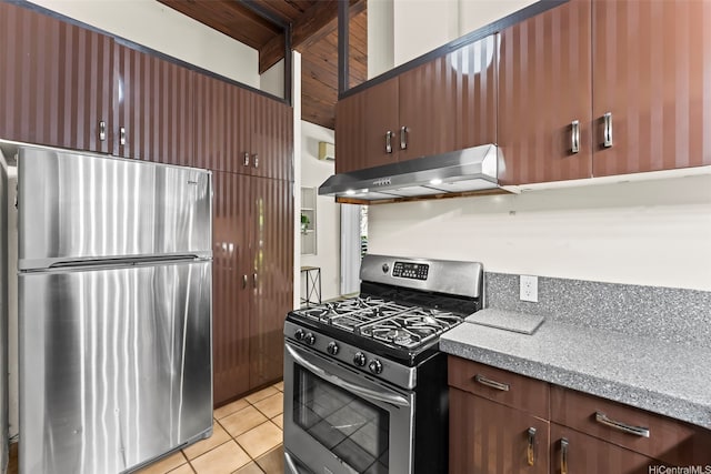 222 Kawaikui Pl, Honolulu, HI 96821 - kitchen with appliances with stainless steel finishes, under cabinet range hood, light tile patterned flooring, and light stone countertops