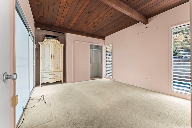 222 Kawaikui Pl, Honolulu, HI 96821 - carpeted empty room with a wood ceiling with exposed beams