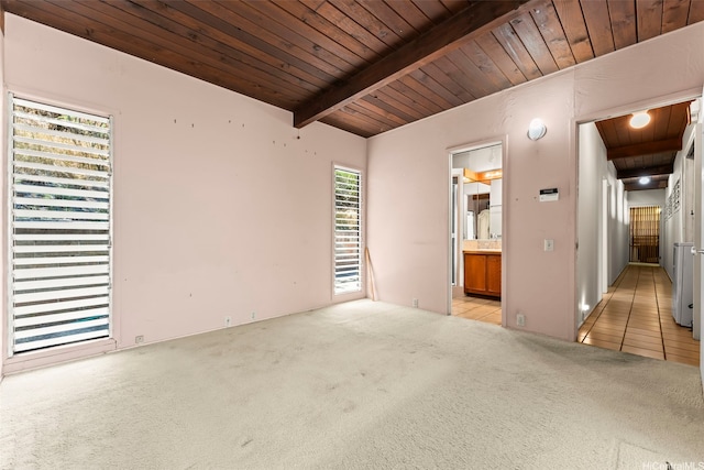 222 Kawaikui Pl, Honolulu, HI 96821 - empty room with a wood ceiling with exposed beams, light colored carpet, and light tile patterned flooring