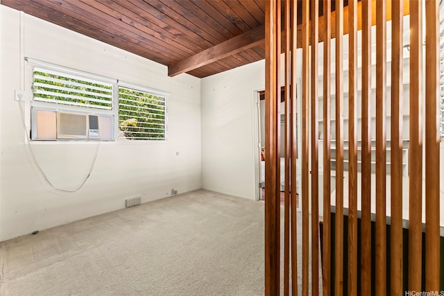 222 Kawaikui Pl, Honolulu, HI 96821 - carpeted empty room with a wood ceiling with exposed beams