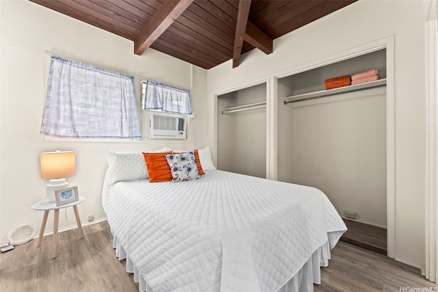 222 Kawaikui Pl, Honolulu, HI 96821 - bedroom with a wooden ceiling with exposed beams, wood finished floors, and multiple closets