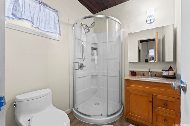 222 Kawaikui Pl, Honolulu, HI 96821 - full bathroom with a shower stall, vanity, and wood finished floors
