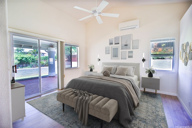 94-1043 Alelo St, Waipahu, HI 96797 - bedroom with a wall mounted AC, access to exterior, wood finished floors, high vaulted ceiling, and ceiling fan
