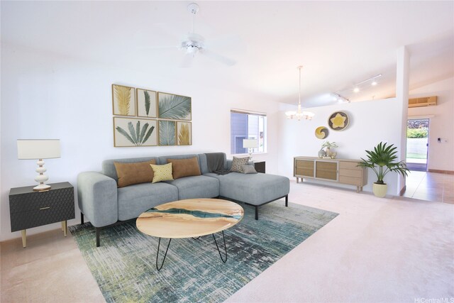 94-1043 Alelo St, Waipahu, HI 96797 - living room with light carpet, plenty of natural light, rail lighting, and a chandelier