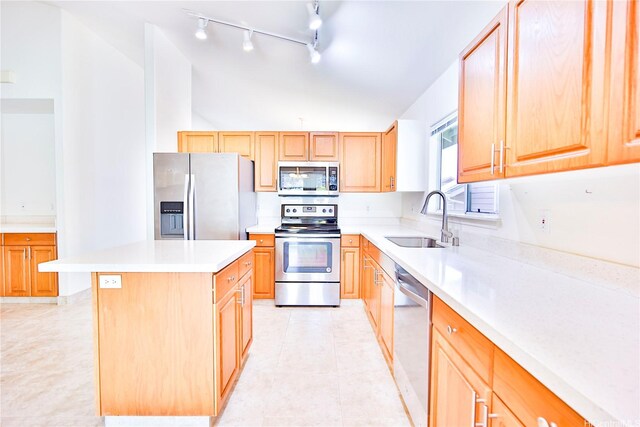 94-1043 Alelo St, Waipahu, HI 96797 - kitchen with appliances with stainless steel finishes, light brown cabinetry, light countertops, and lofted ceiling