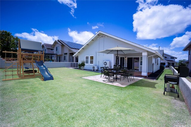 94-1043 Alelo St, Waipahu, HI 96797 - rear view of house featuring a fenced backyard, a playground, and a patio