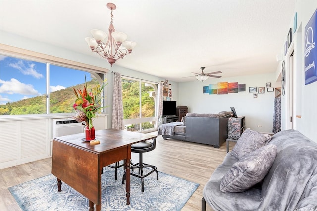 1022 Prospect St Unit 704A, Honolulu, HI 96822 - office featuring a chandelier, light wood-type flooring, and ceiling fan