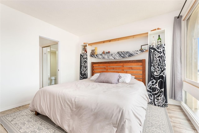 1022 Prospect St Unit 704A, Honolulu, HI 96822 - bedroom with wood finished floors